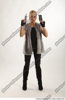 NIKOL STANDING POSE WITH TWO GUNS